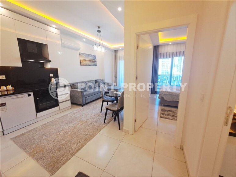 Светлая квартира 1+1, 65 м² в Махмутларе в комплексе с богатой инфраструктурой-id-10193-фото-4