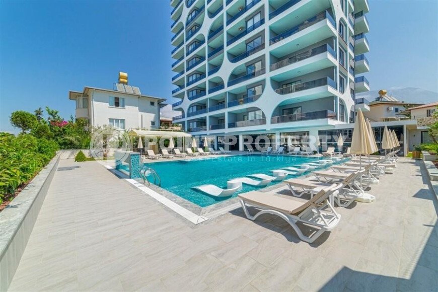 Elegant 1+1 apartment, 60 m² in Mahmutlar with mountain views-id-10200-photo-1