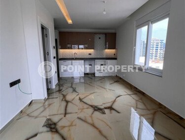 New 1+1 apartment, 50 m² in Mahmutlar with views of the surrounding area and a strip of sea-id-10203-photo-2