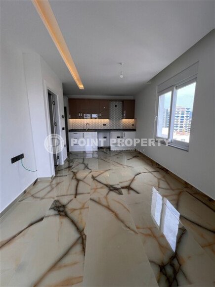New 1+1 apartment, 50 m² in Mahmutlar with views of the surrounding area and a strip of sea-id-10203-photo-1