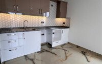 Новая квартира 1+1, 50 м² в Махмутларе с видом на окрестности и полоску моря-id-10203-фото-2