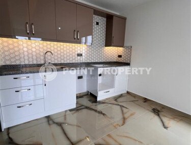 Новая квартира 1+1, 50 м² в Махмутларе с видом на окрестности и полоску моря-id-10203-фото-2