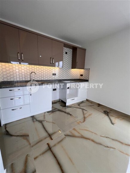 Новая квартира 1+1, 50 м² в Махмутларе с видом на окрестности и полоску моря-id-10203-фото-2