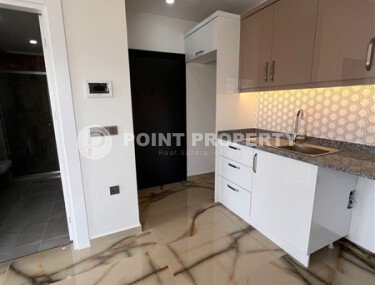 Новая квартира 1+1, 50 м² в Махмутларе с видом на окрестности и полоску моря-id-10203-фото-4