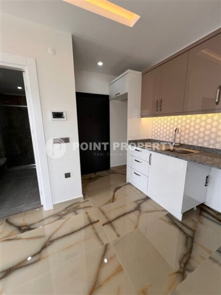 Новая квартира 1+1, 50 м² в Махмутларе с видом на окрестности и полоску моря-id-10203-фото-4