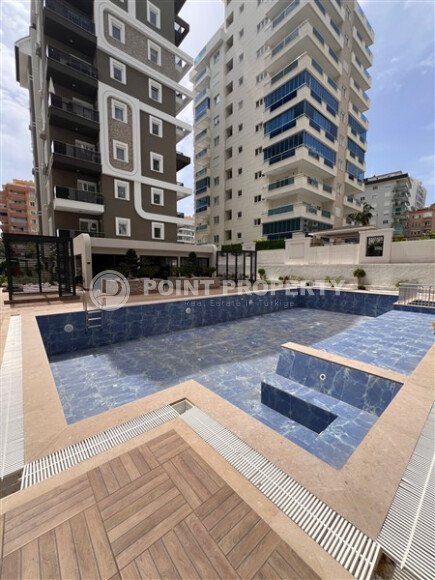 Новая квартира 1+1, 50 м² в Махмутларе с видом на окрестности и полоску моря-id-10203-фото-12