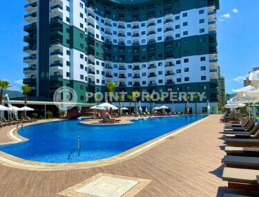 Современная квартира 1+1, 55 м² в Махмутларе с частичным видом на море-id-10204-фото-1