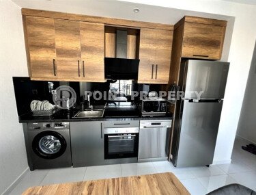 Современная квартира 1+1, 55 м² в Махмутларе с частичным видом на море-id-10204-фото-2