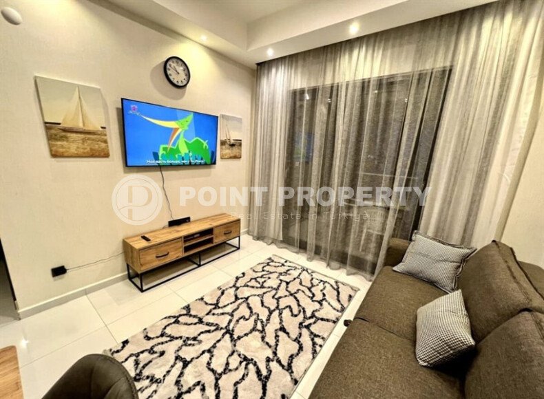 Современная квартира 1+1, 55 м² в Махмутларе с частичным видом на море-id-10204-фото-3