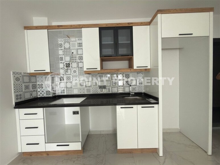 Modern apartment 55 m² in Mahmutlar area-id-10207-photo-2