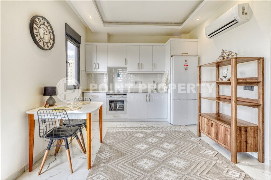 Стильная квартира 50 м² в районе Махмутлар с видом на море и крепость-id-10208-фото-1