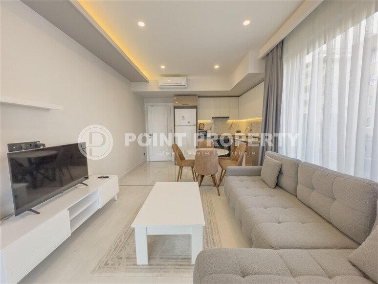 Elegant 2+1 apartment, 96 m² in the center of Alanya in the Cleopatra area with indoor parking and a residence permit-id-10217-photo-2