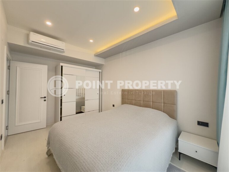 Elegant 2+1 apartment, 96 m² in the center of Alanya in the Cleopatra area with indoor parking and a residence permit-id-10217-photo-4