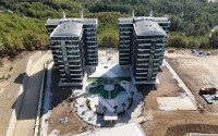 Квартиры 1+1 в премиальном комплексе в районе Авсаллар-id-10220-фото-2