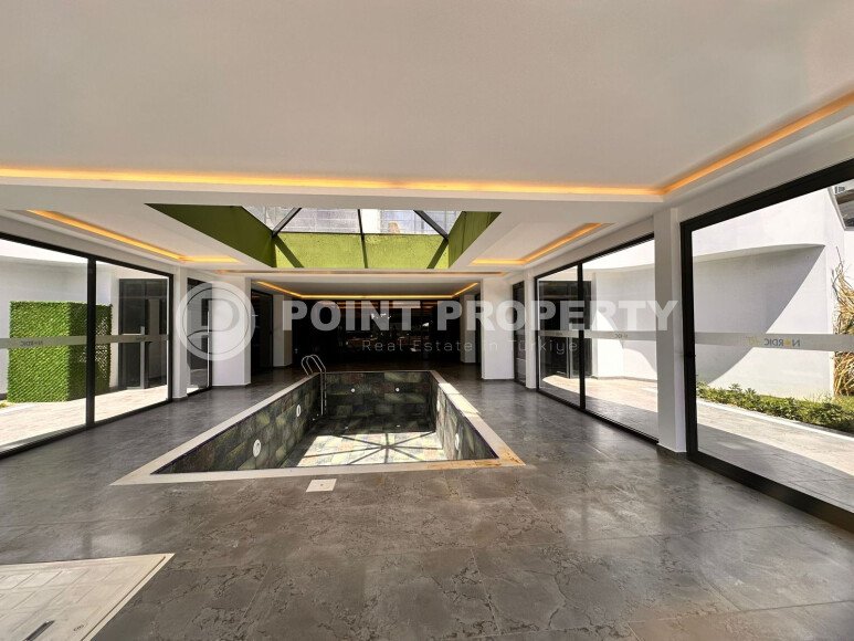 Дублекс 2+1 с выходом в сад в комплексе премиум класса в районе Каргыджак-id-10221-фото-12