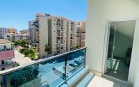 Sunny 1+1 apartment, 62 m² in Mahmutlar with panoramic windows-id-10225-photo-8