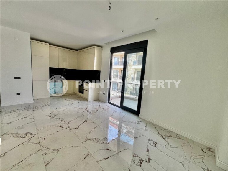 Современная квартира 1+1 площадью 51 м² в престижном жилом комплексе с развитой инфраструктурой в районе Оба-id-10227-фото-3