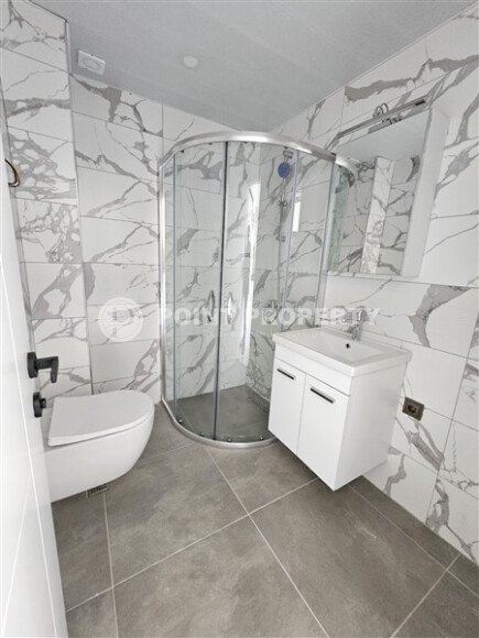 Просторная квартира 1+1 площадью 59 м² с видом на море и горы в комплексе комфорт-класса в Махмутларе-id-10229-фото-5