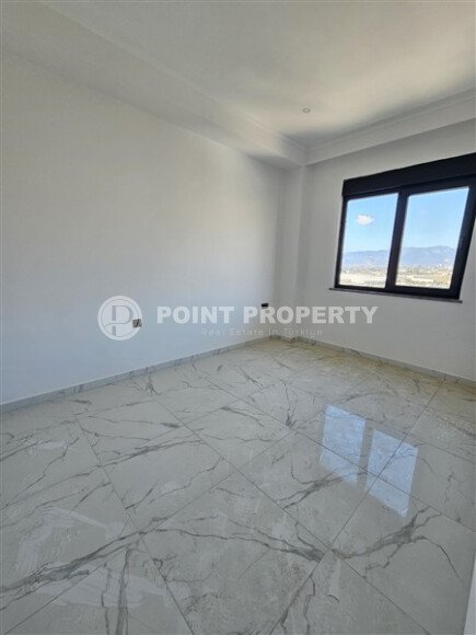 Просторная квартира 1+1 площадью 59 м² с видом на море и горы в комплексе комфорт-класса в Махмутларе-id-10229-фото-6