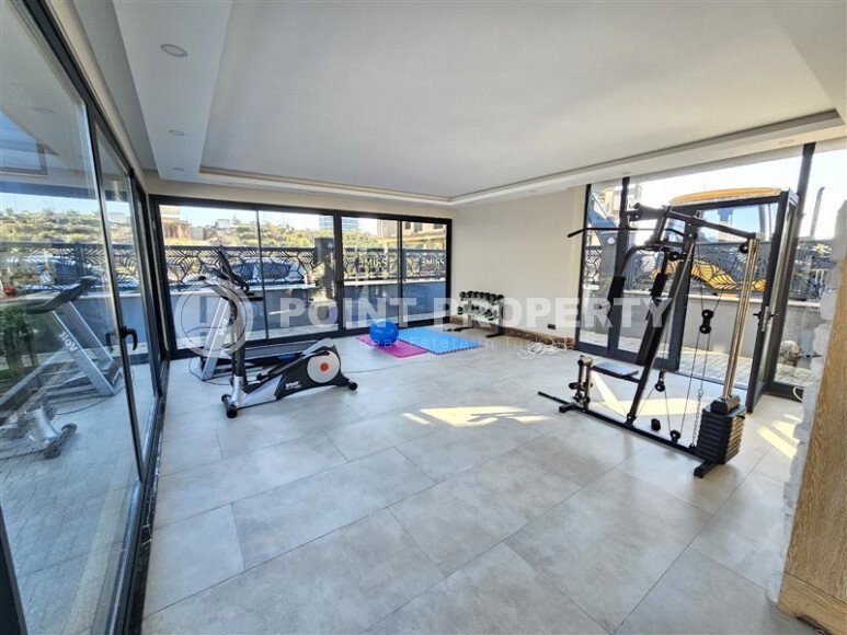 Просторная квартира 1+1 площадью 59 м² с видом на море и горы в комплексе комфорт-класса в Махмутларе-id-10229-фото-7