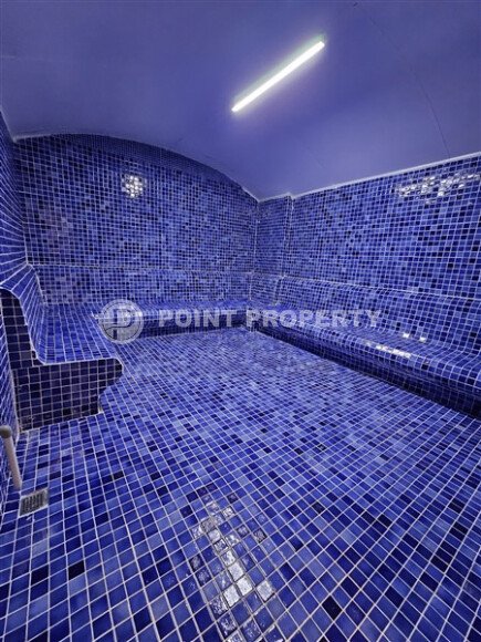 Просторная квартира 1+1 площадью 59 м² с видом на море и горы в комплексе комфорт-класса в Махмутларе-id-10229-фото-8