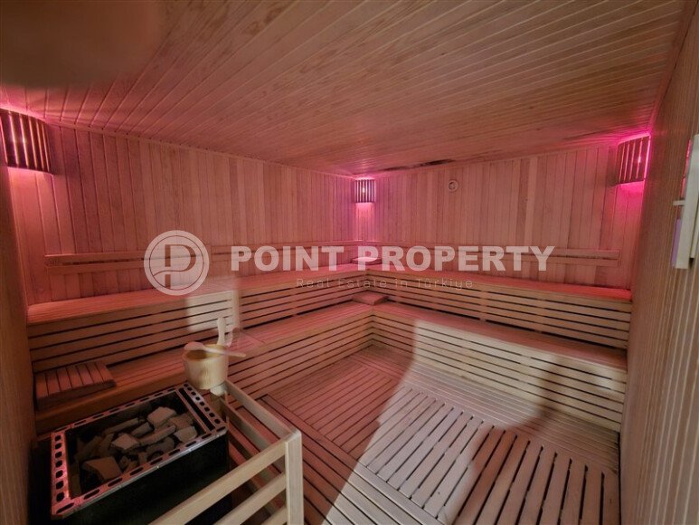 Просторная квартира 1+1 площадью 59 м² с видом на море и горы в комплексе комфорт-класса в Махмутларе-id-10229-фото-10