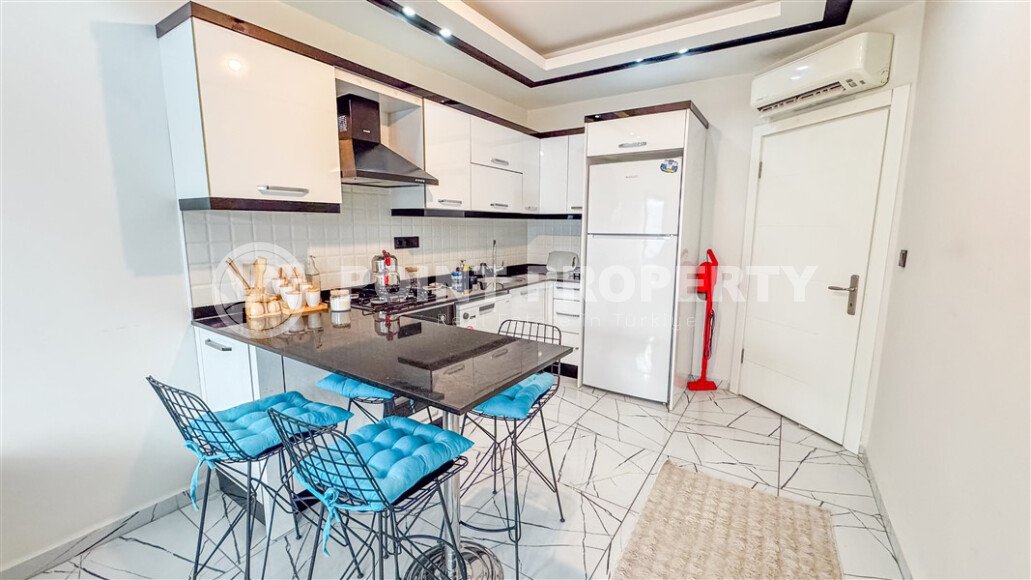 Элегантная квартира 1+1, 60 м² в центре Аланьи у пляжа Кейкубат с панорамной террасой на крыше-id-10230-фото-1