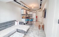 Элегантная квартира 1+1, 60 м² в центре Аланьи у пляжа Кейкубат с панорамной террасой на крыше-id-10230-фото-2