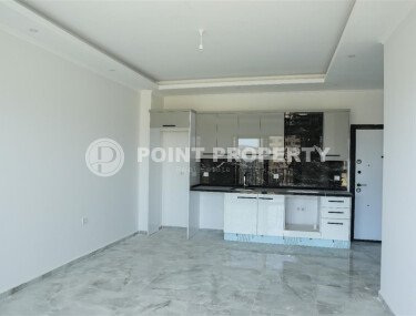 Новая квартира 50 м² в районе Махмутлар, Аланья-id-10233-фото-2