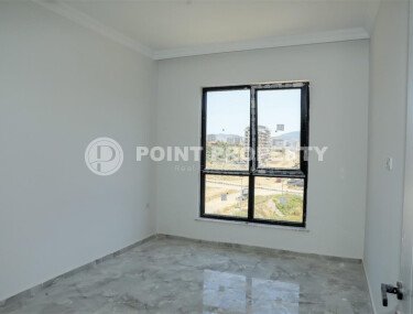 Новая квартира 50 м² в районе Махмутлар, Аланья-id-10233-фото-4