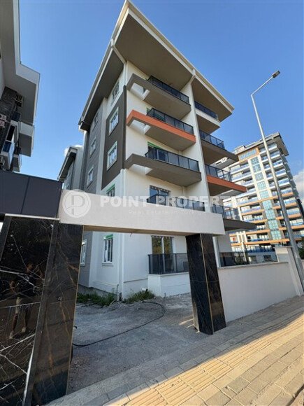 A cozy and bright 1+1 apartment of 54 m² in a new residential complex with green infrastructure in Mahmutlar-id-10235-photo-1