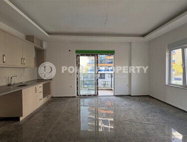 Уютная и светлая квартира 1+1 площадью 54 м² в новом жилом комплексе с зелёной инфраструктурой в Махмутларе-id-10235-фото-2