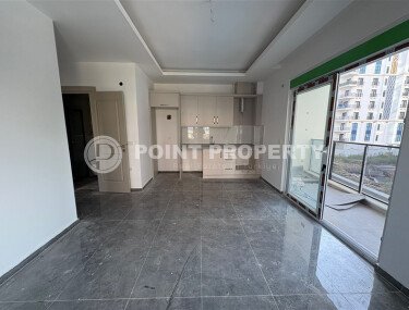 A cozy and bright 1+1 apartment of 54 m² in a new residential complex with green infrastructure in Mahmutlar-id-10235-photo-3