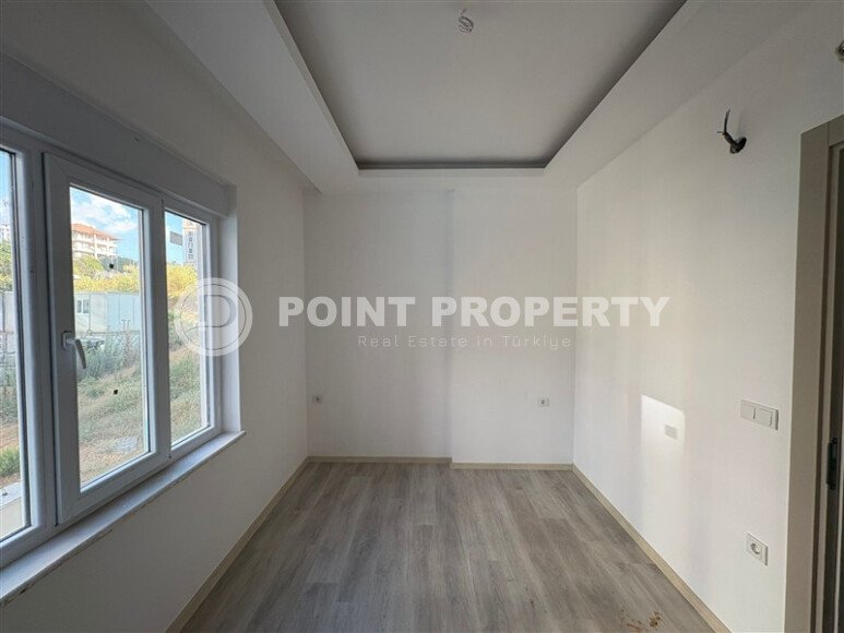 A cozy and bright 1+1 apartment of 54 m² in a new residential complex with green infrastructure in Mahmutlar-id-10235-photo-5