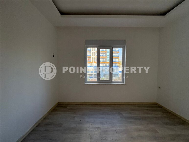 A cozy and bright 1+1 apartment of 54 m² in a new residential complex with green infrastructure in Mahmutlar-id-10235-photo-6