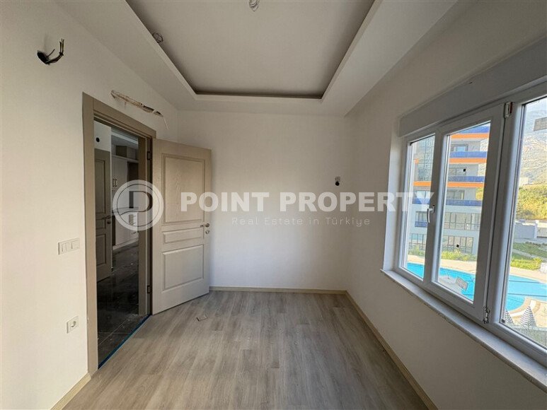 A cozy and bright 1+1 apartment of 54 m² in a new residential complex with green infrastructure in Mahmutlar-id-10235-photo-7