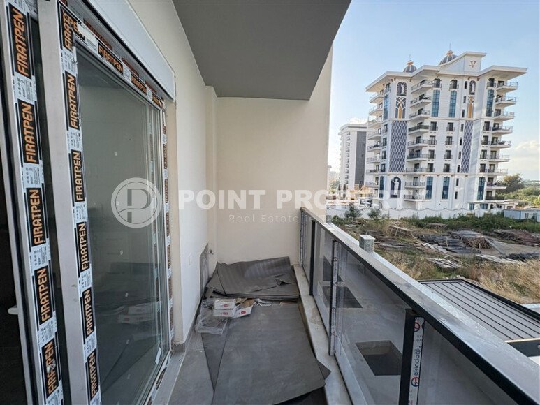 A cozy and bright 1+1 apartment of 54 m² in a new residential complex with green infrastructure in Mahmutlar-id-10235-photo-8