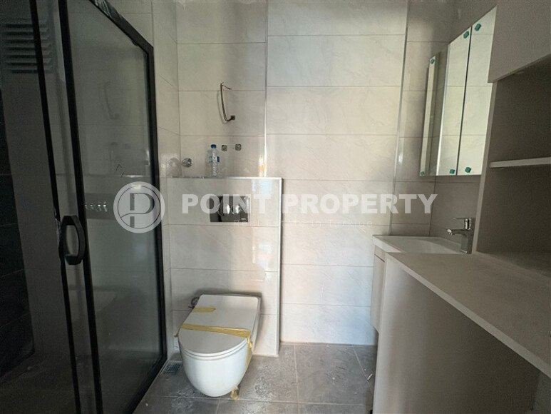 A cozy and bright 1+1 apartment of 54 m² in a new residential complex with green infrastructure in Mahmutlar-id-10235-photo-9