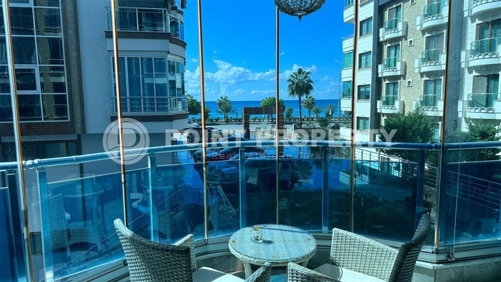 100 m² apartment with direct sea views in Kestel in a complex on the first line-id-10241-photo-1