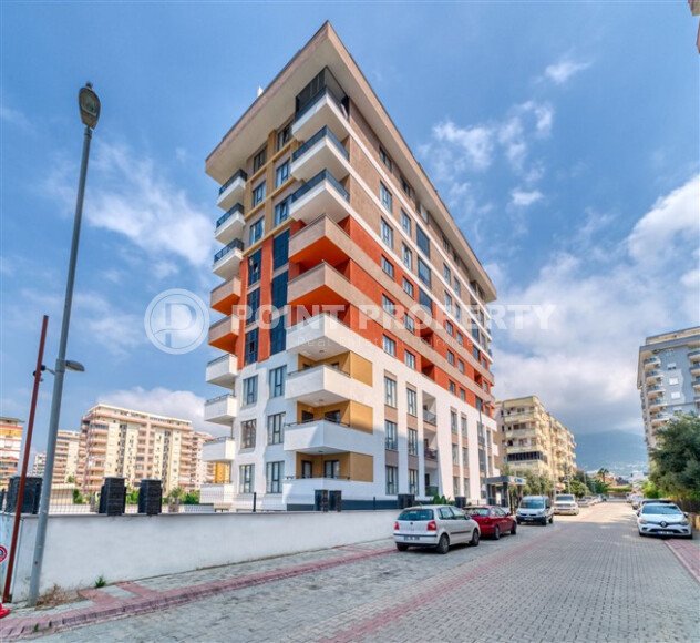 Furnished 1+1 apartment with partial sea view in a complex with infrastructure in Mahmutlar-id-10243-photo-1