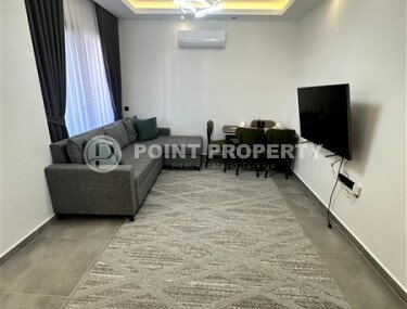 Furnished 1+1 apartment with partial sea view in a complex with infrastructure in Mahmutlar-id-10243-photo-2