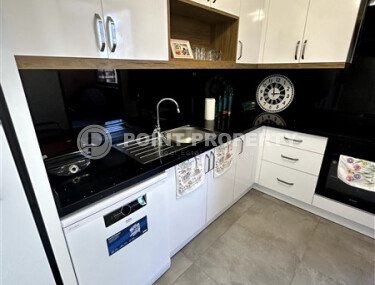 Furnished 1+1 apartment with partial sea view in a complex with infrastructure in Mahmutlar-id-10243-photo-4