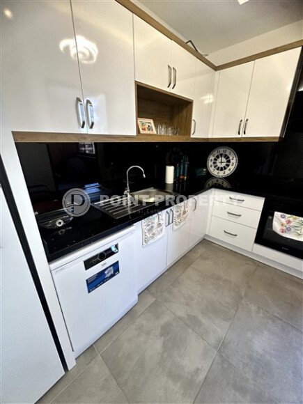 Furnished 1+1 apartment with partial sea view in a complex with infrastructure in Mahmutlar-id-10243-photo-4