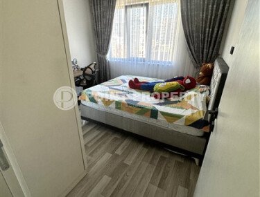 Furnished 1+1 apartment with partial sea view in a complex with infrastructure in Mahmutlar-id-10243-photo-5