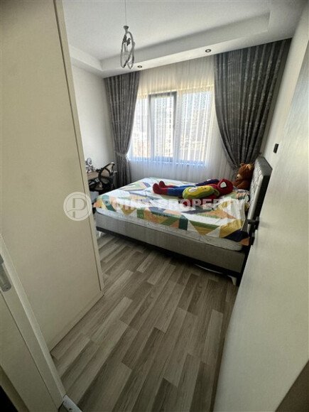 Furnished 1+1 apartment with partial sea view in a complex with infrastructure in Mahmutlar-id-10243-photo-5
