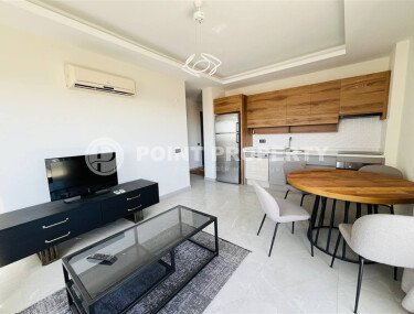 Furnished 2+1 apartment with sea views in a complex with infrastructure in Mahmutlar-id-10244-photo-1