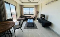 Furnished 2+1 apartment with sea views in a complex with infrastructure in Mahmutlar-id-10244-photo-2