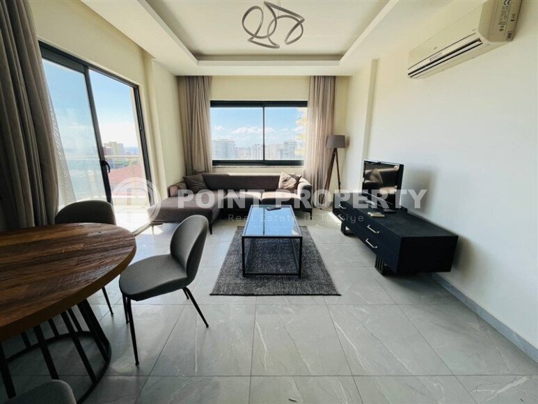 Furnished 2+1 apartment with sea views in a complex with infrastructure in Mahmutlar-id-10244-photo-2