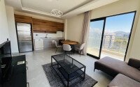 Furnished 2+1 apartment with sea views in a complex with infrastructure in Mahmutlar-id-10244-photo-3