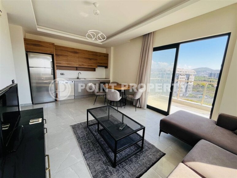 Furnished 2+1 apartment with sea views in a complex with infrastructure in Mahmutlar-id-10244-photo-3